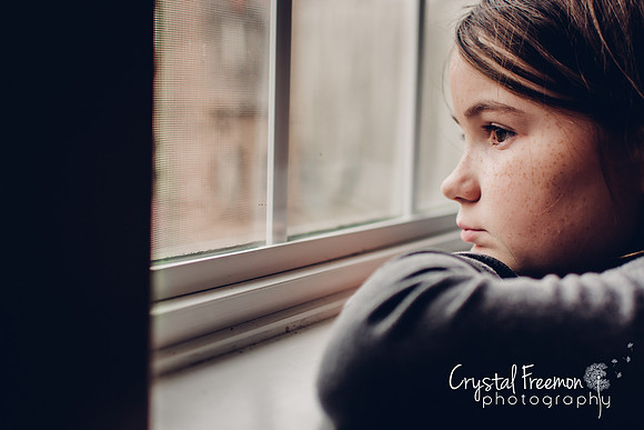 Megan Staring out Window