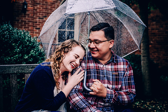 Happy Married Couple In The Rain In Downtown Franklin, TN