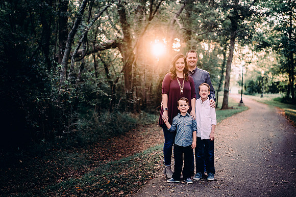 Two Boys and Their Parents On A Path In Spring Hill TN