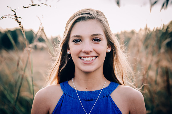 Teen girl in a field at Henry Horton State Park for Senior Portrait Session